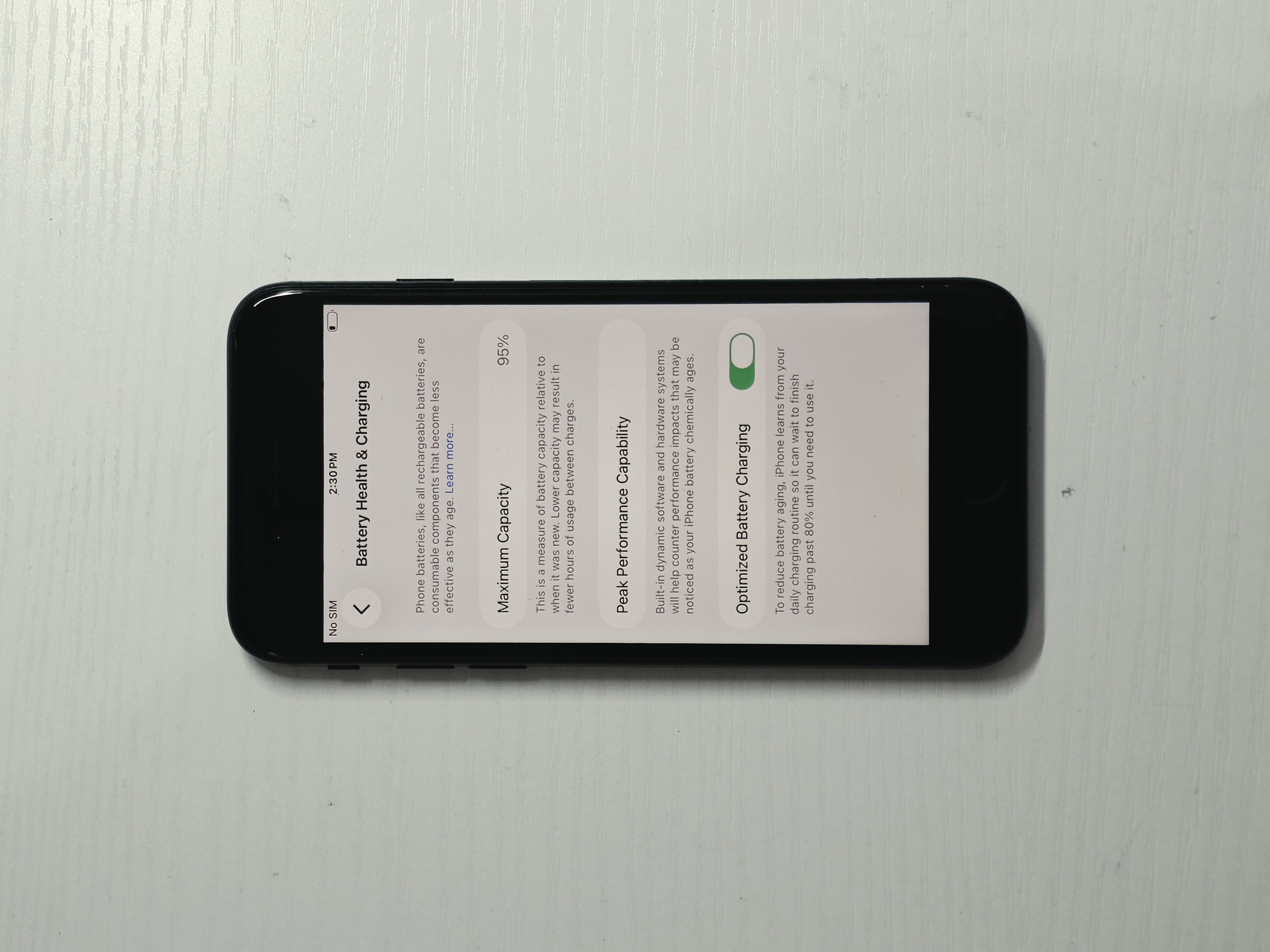 iPhone SE (2022) · Black · 128GB · Used · Like New · Battery Health: 95% — photo 3 of 4