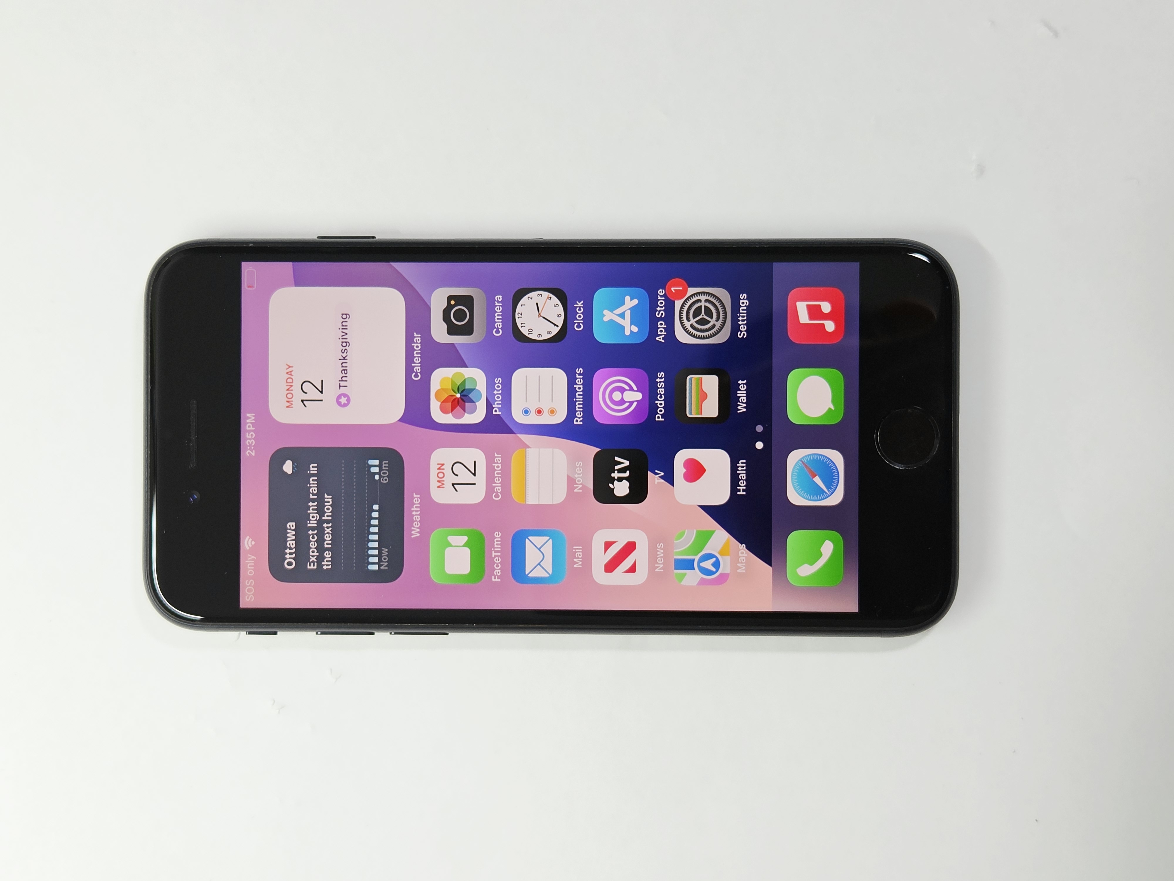 iPhone SE (2022) · Midnight · 128 GB · Used · Like New · Battery Health: 95% — photo 2 of 4