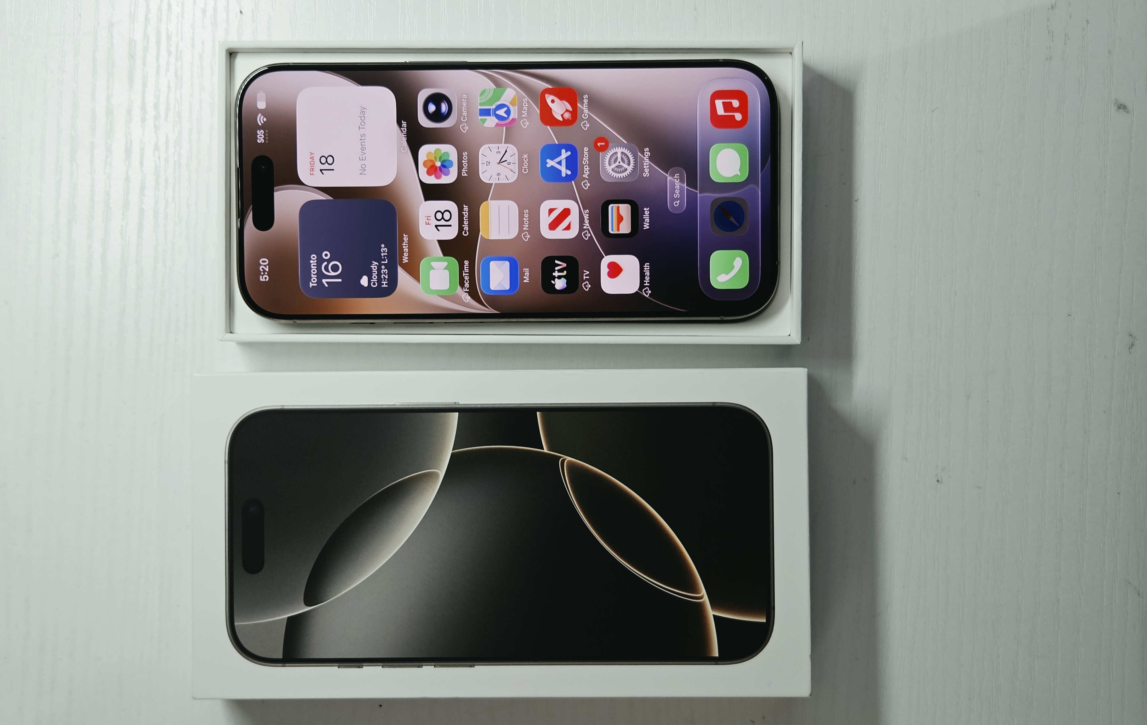iPhone 16 Pro · Natural Titanium · 128 GB · Used · Like New · Battery Health: 87% — photo 2 of 4