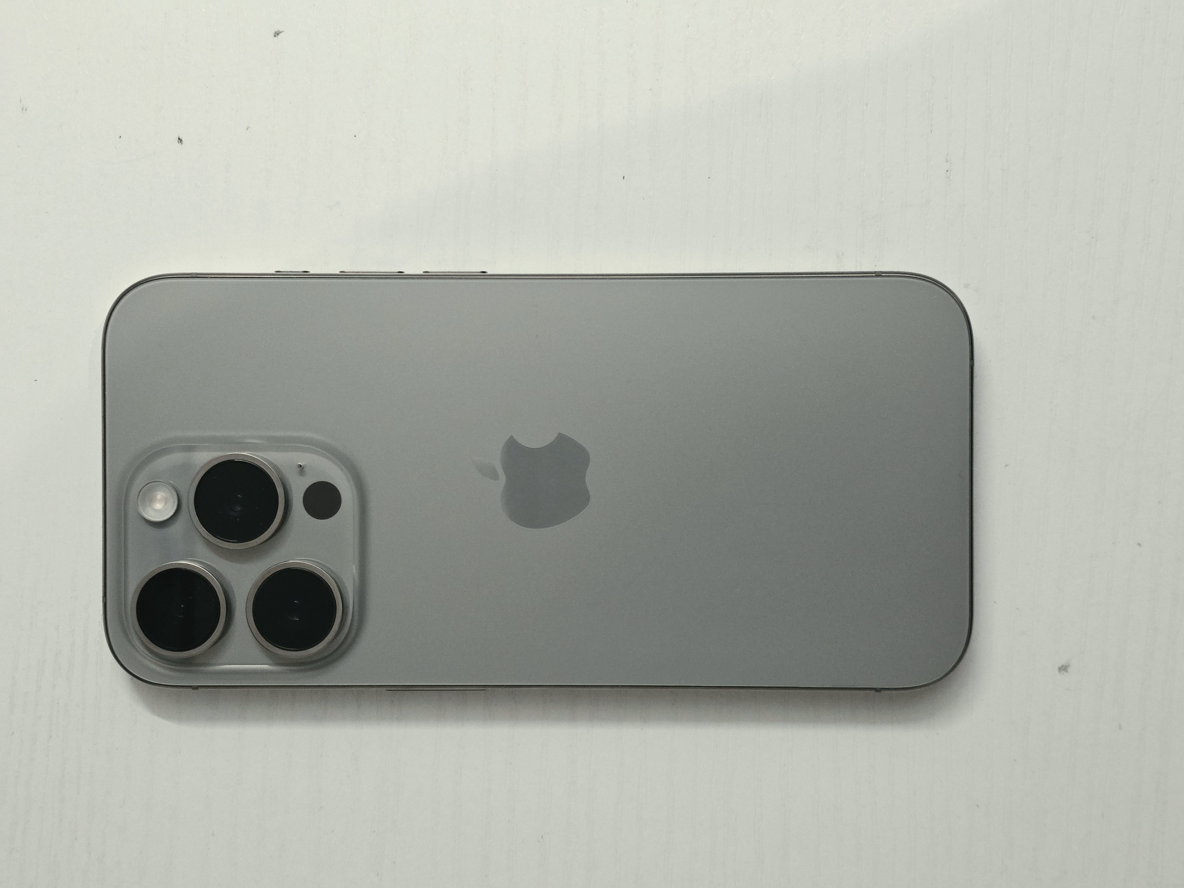 iPhone 15 Pro · Natural Titanium · 128 GB · Used · Like New · Battery Health: 87% · Previous Repairs — photo 3 of 4