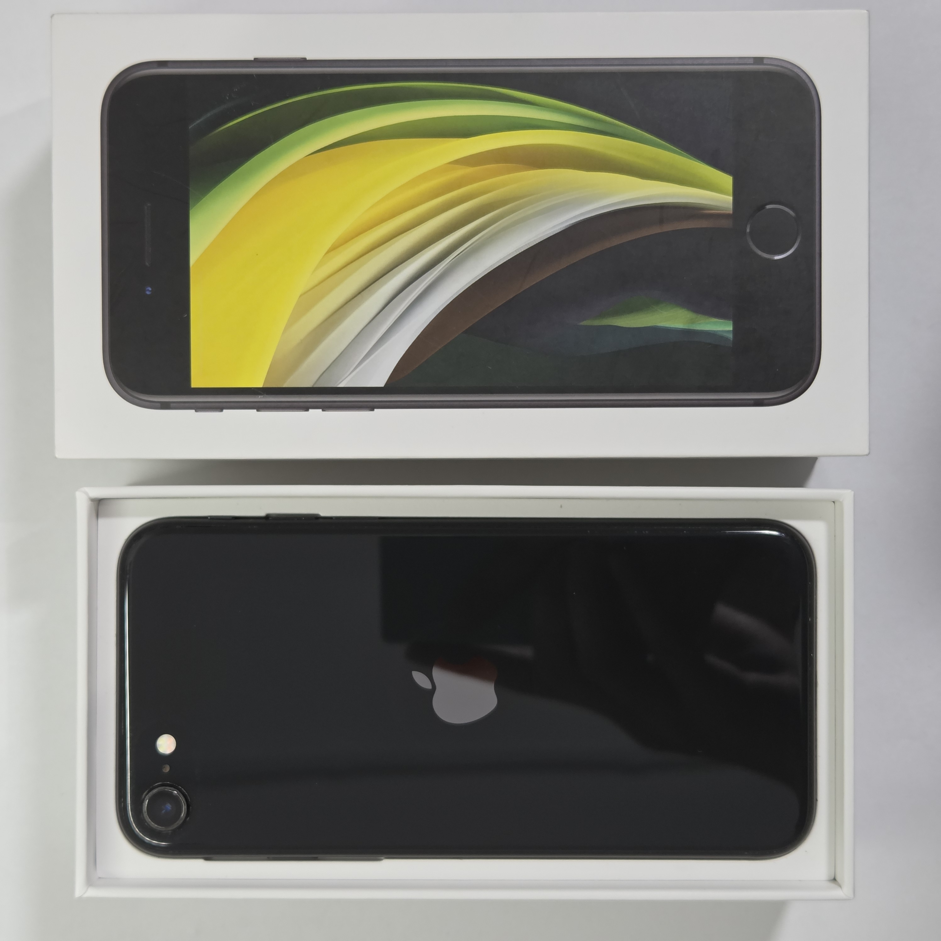 iPhone SE (2020) · Black · 64 GB · Used · Excellent · Battery Health: 84% · Previous Repairs — photo 4 of 4