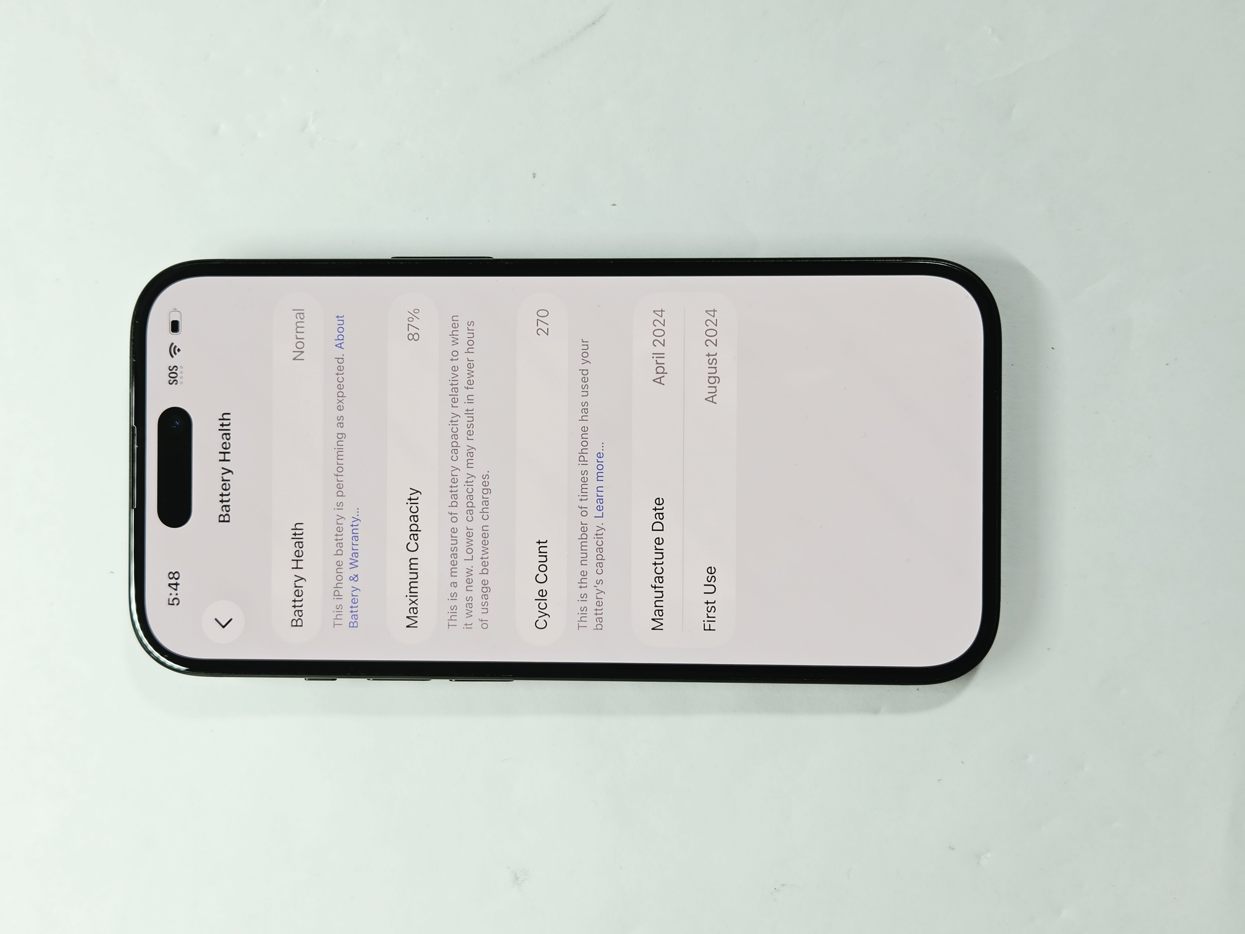 iPhone 15 · Black · 128 GB · Used · Excellent · Battery Health: 87% — photo 3 of 4