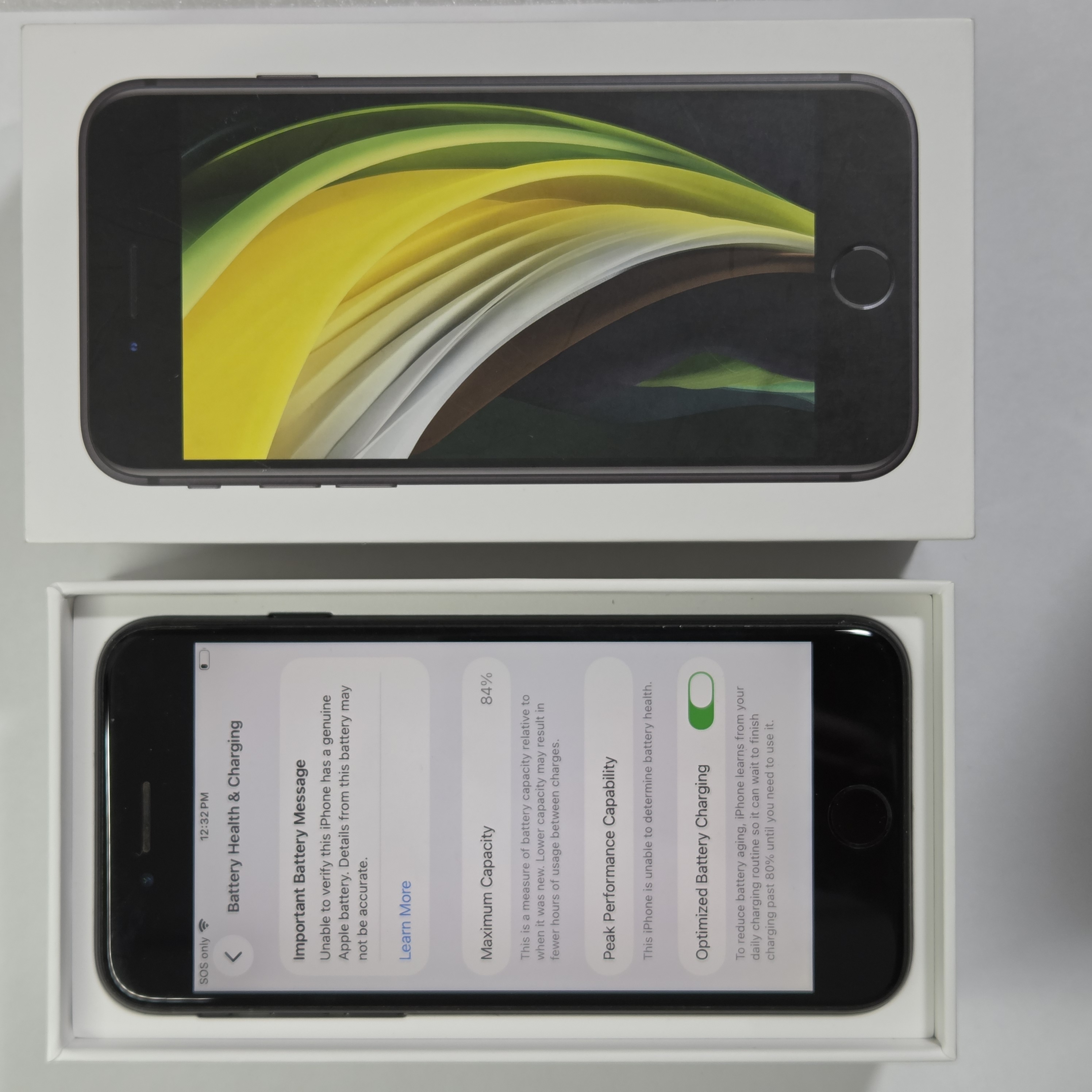 iPhone SE (2020) · Black · 64 GB · Used · Excellent · Battery Health: 84% · Previous Repairs — photo 3 of 4
