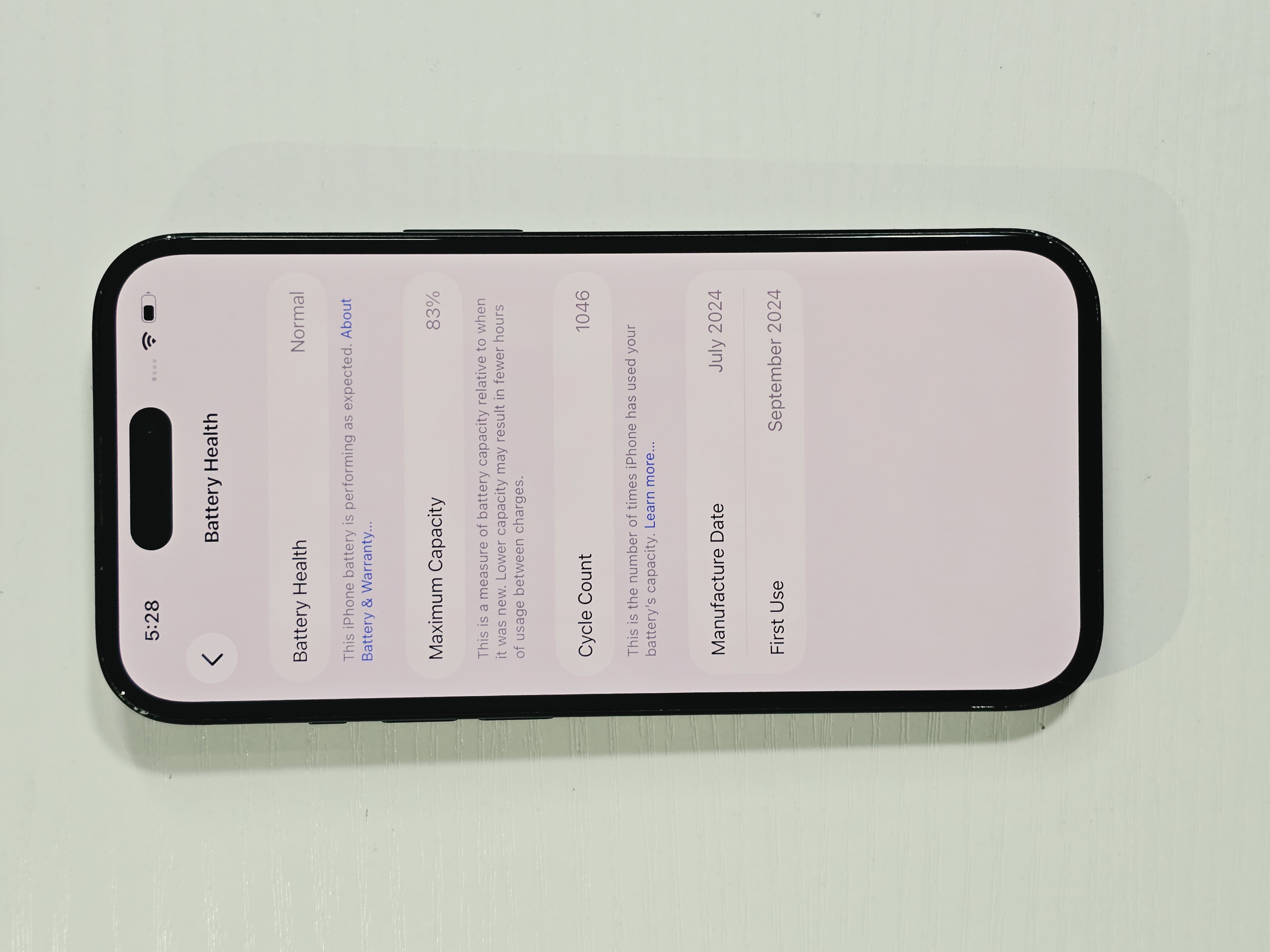 iPhone 15 · Black · 128 GB · Used · Excellent · Battery Health: 83% · Refurbished — photo 4 of 4